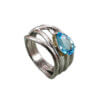 Anello intreccio topazio azzurro destra