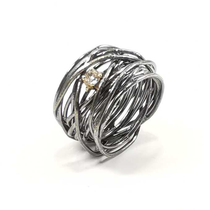 Anello filo di Arianna in argento e oro con 1 diamante sx